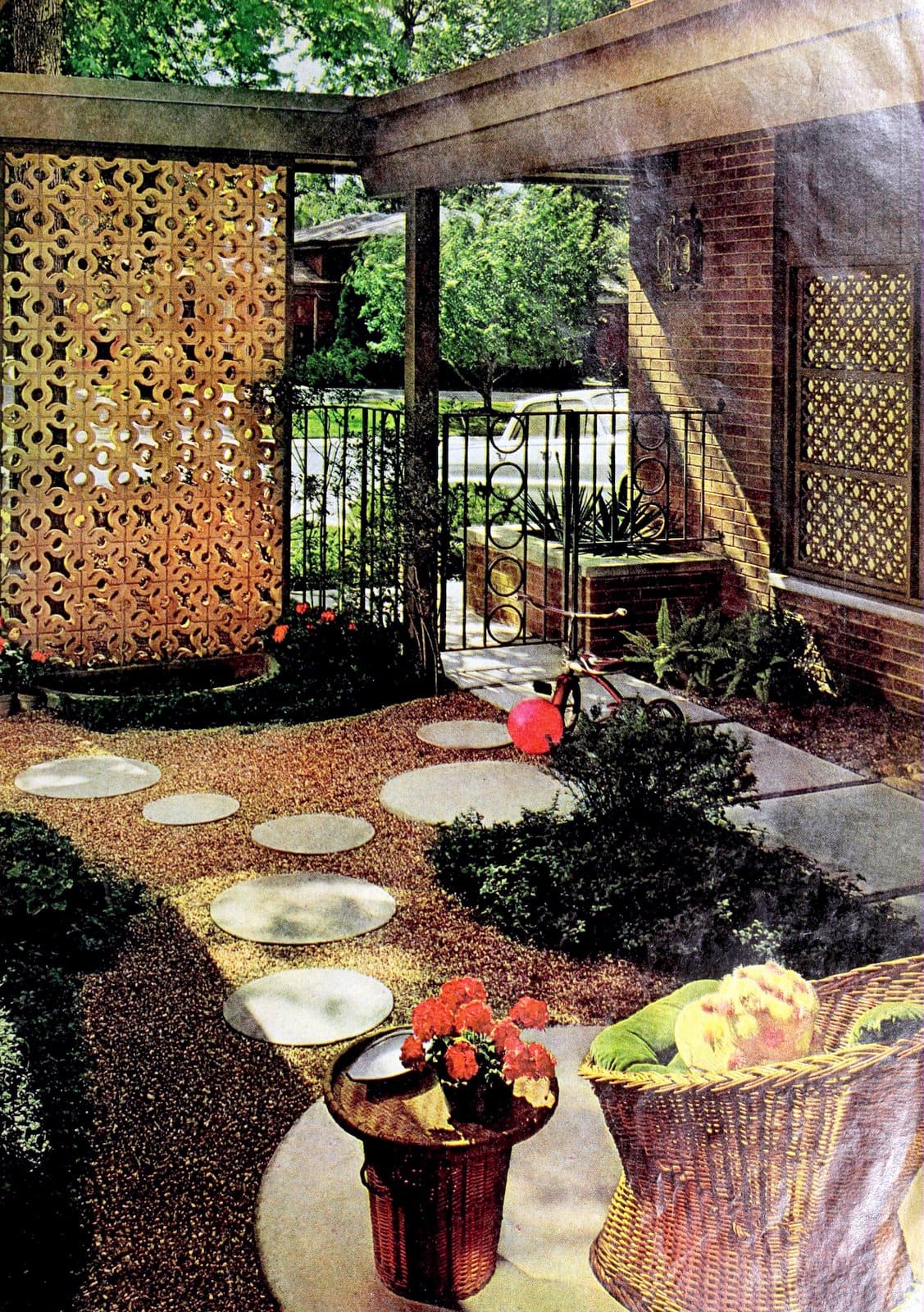 A yard by the street with pierced concrete blocks (1969)