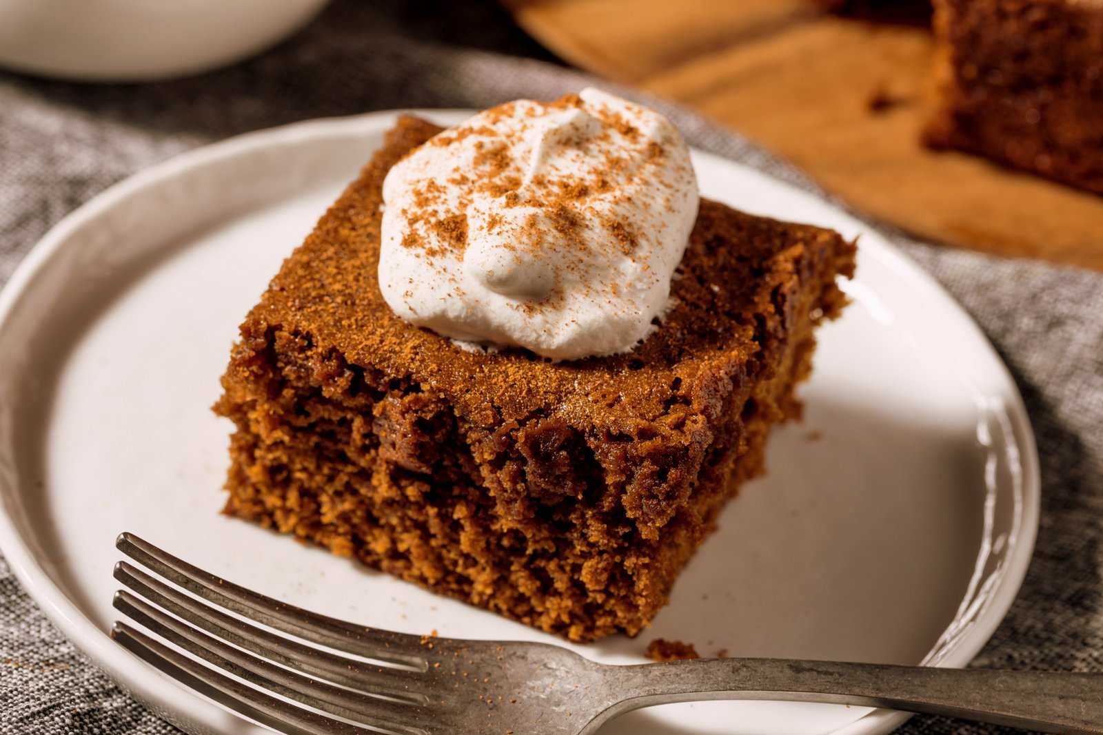 Homemade applesauce cake with whipped cream