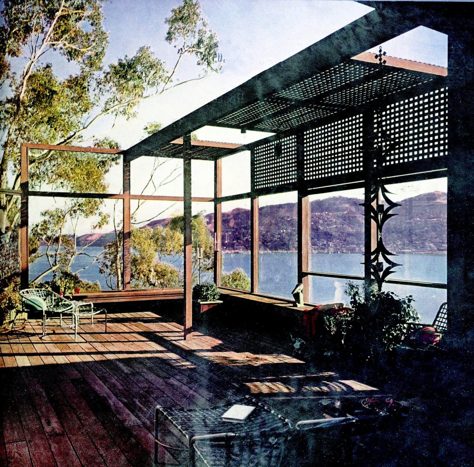 Redwood deck with trellis and windows to a beautiful water view (1962)