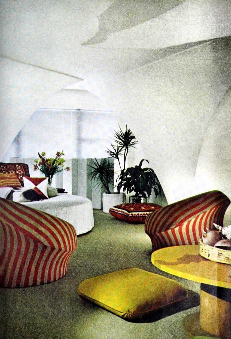 See how sails of fabric turned a plain living room into a space-age pad